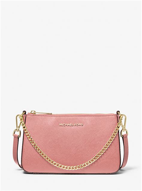 michael michael kors jet set medium saffiano leather clutch|Jet Set Medium Saffiano Leather Clutch .